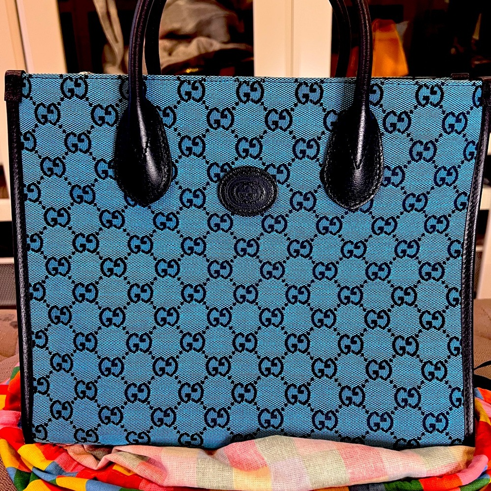 Authentic Gucci Canvas GG/Dollar Pigpr LT Blue